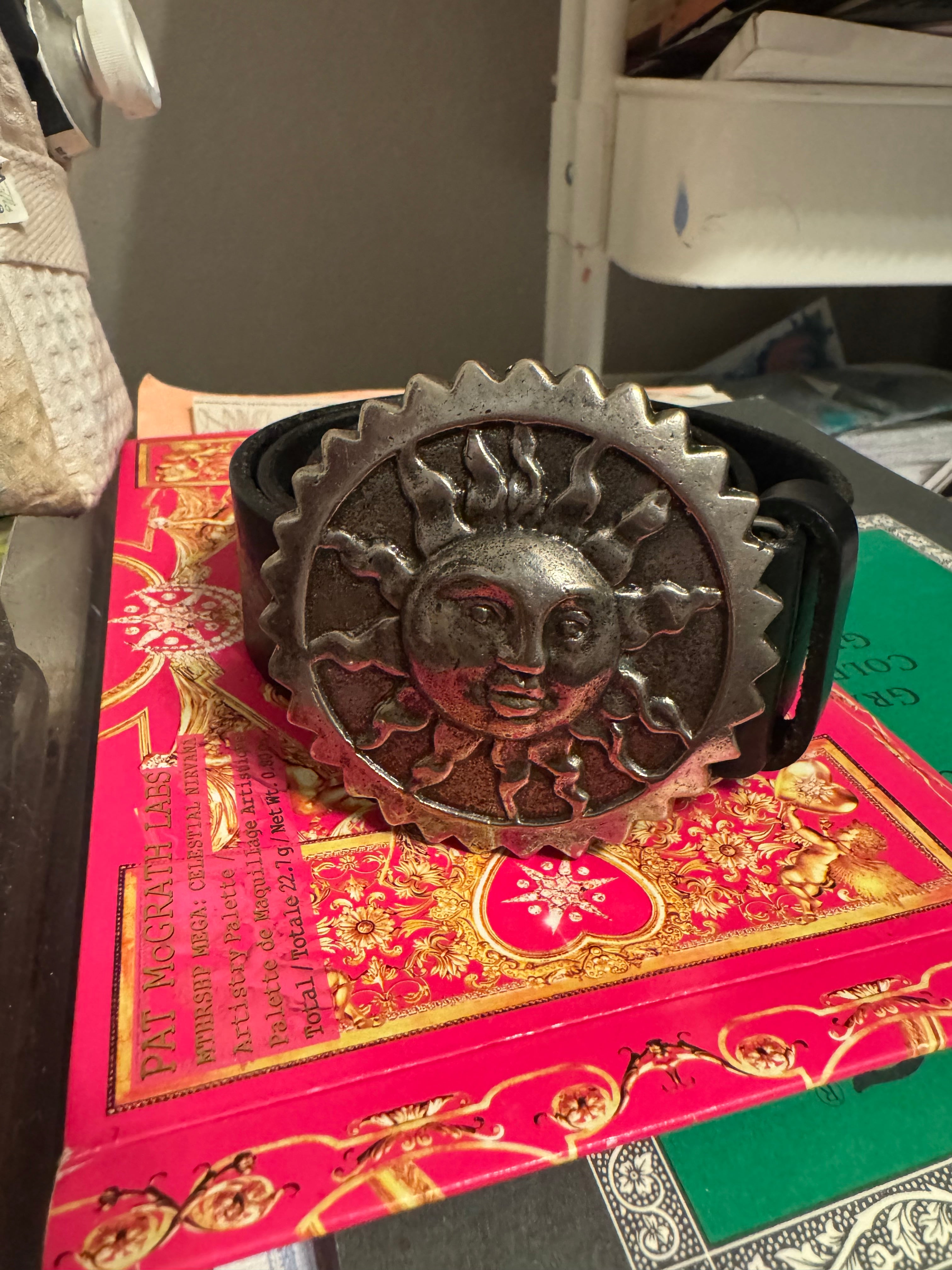 Black Vintage Belt with “Sun-burst,” medallion buckle