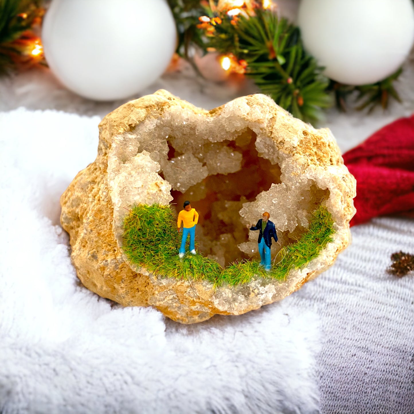 Geode Art piece w/ tiny people at “crystal cave entrance”