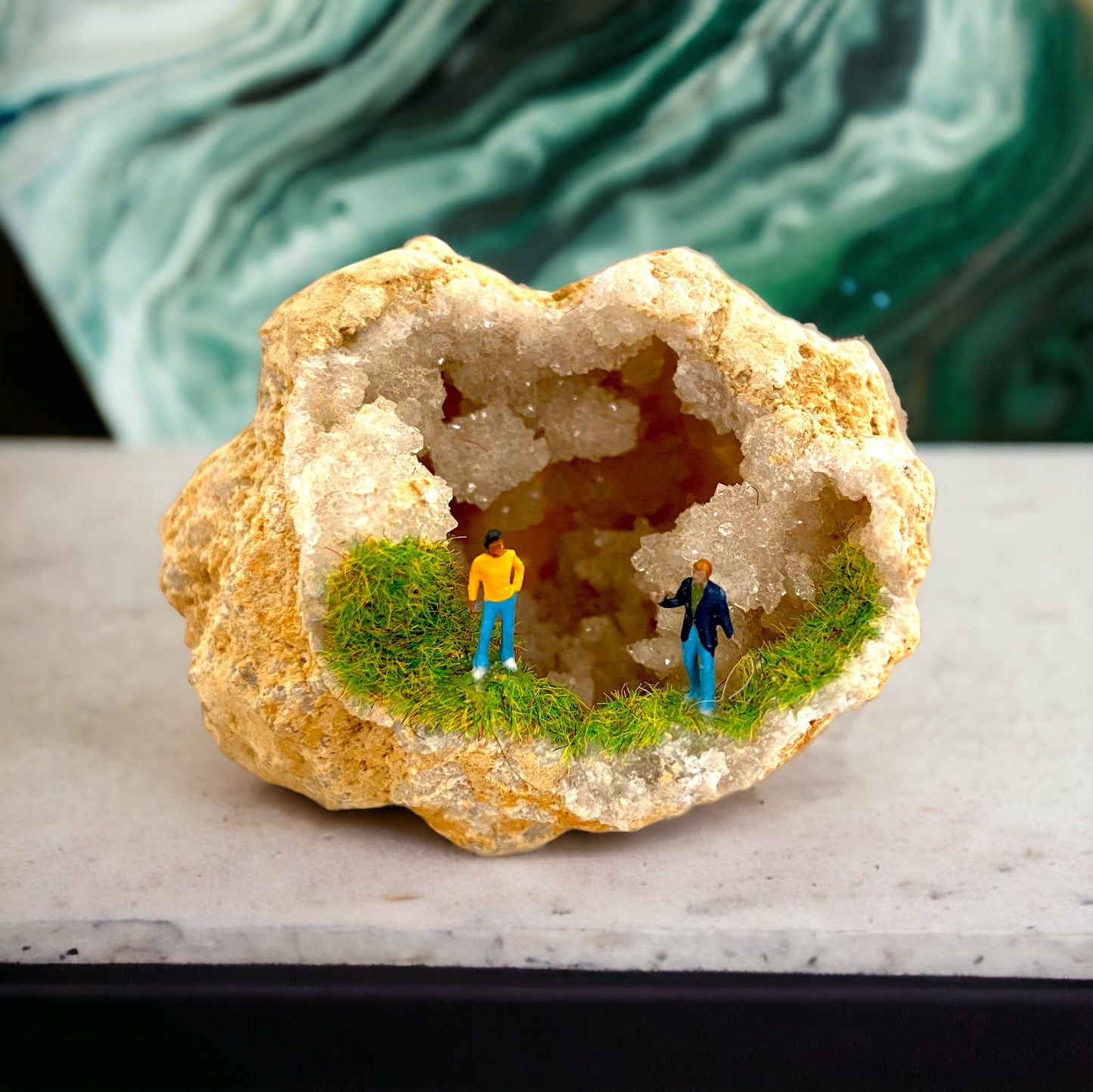 Geode Art piece w/ tiny people at “crystal cave entrance”