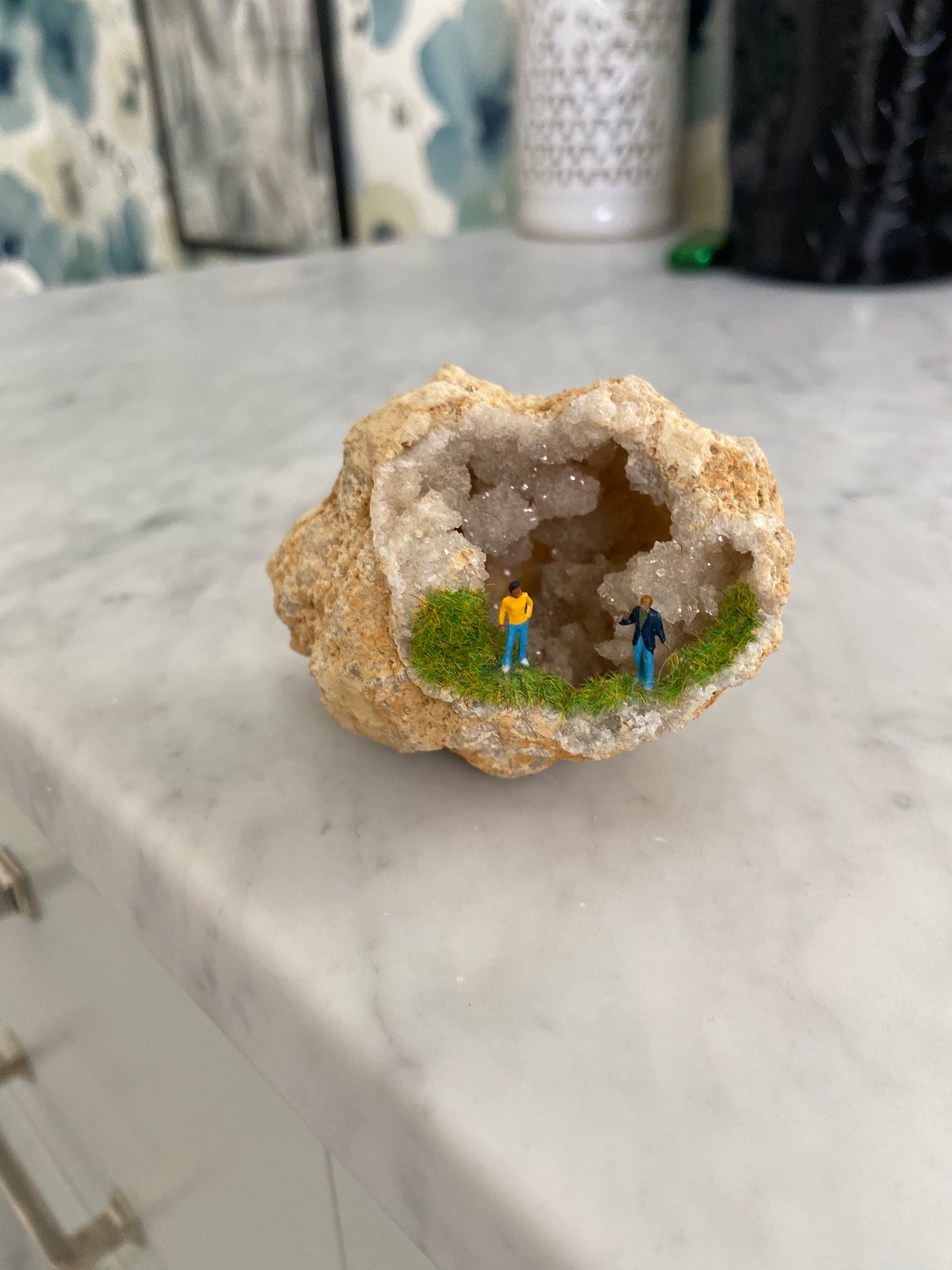 Geode Art piece w/ tiny people at “crystal cave entrance”