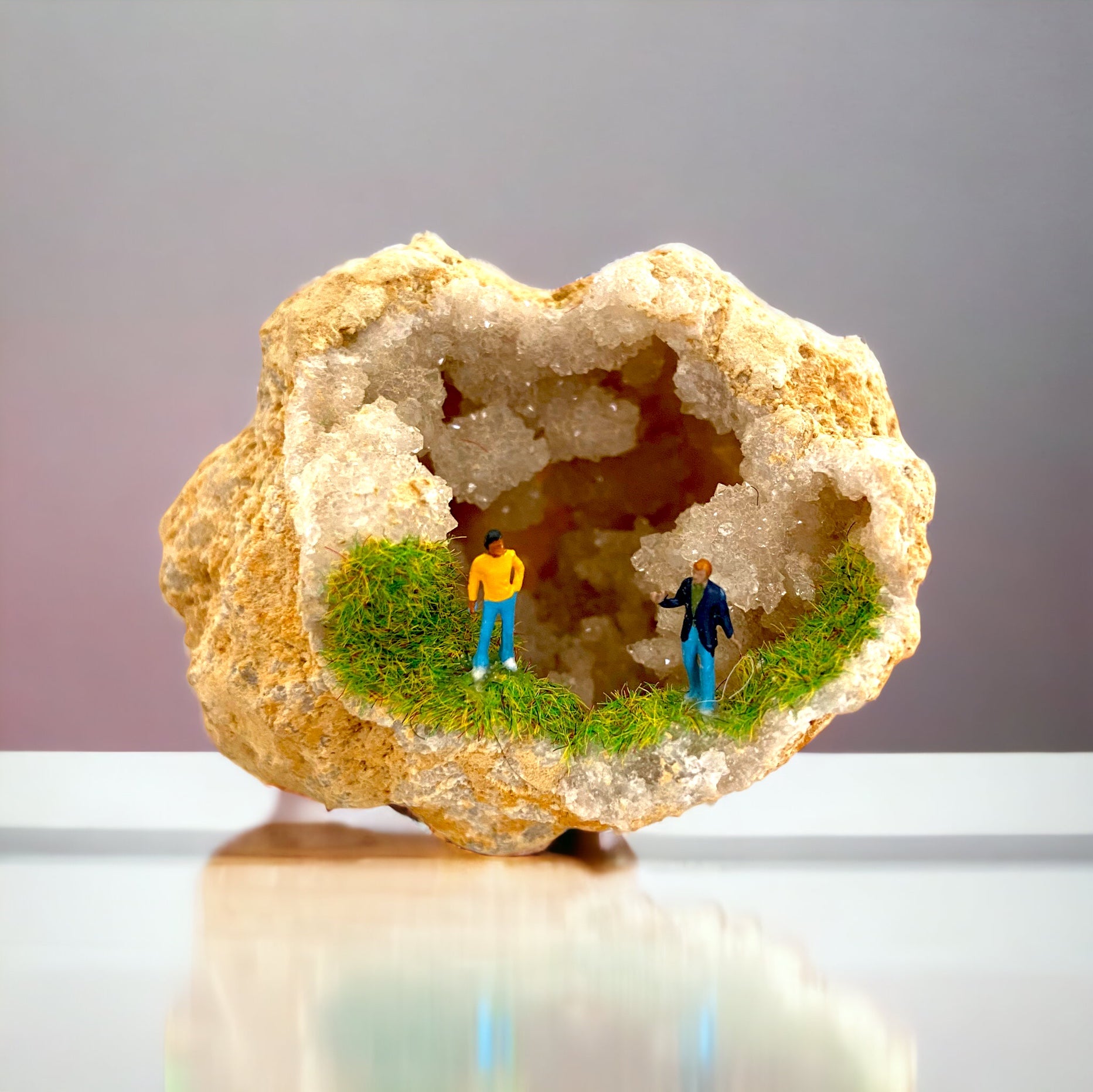 Geode Art piece w/ tiny people at “crystal cave entrance”